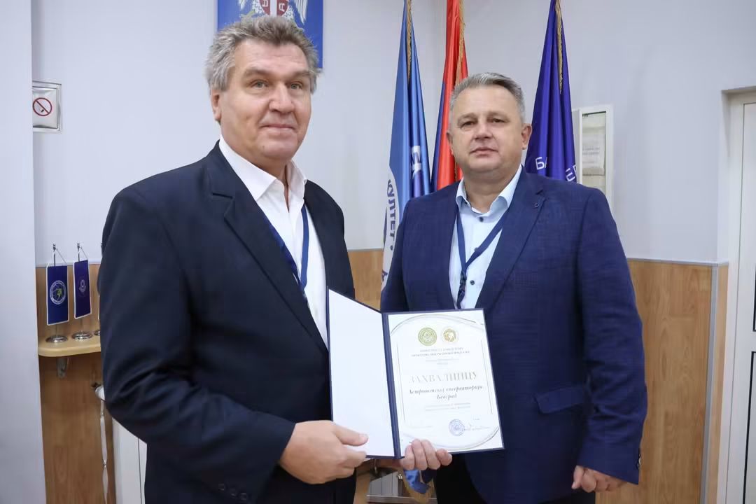 Presentation of the Certificate of Appreciation to the Astronomical Observatory: Prof. Luka Č. Popović (Director of AO) and Prof. Goran Trbić (Dean of the PMF)